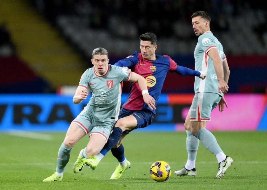 Barca Lose Top Spot After Late Loss To Atletico