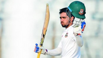 Ton-up Mominul powers Bangladesh on day One