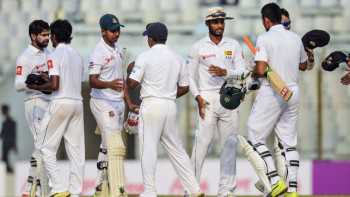 Mominul guides Tigers to draw