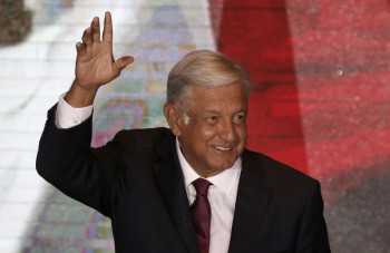 Mexico’s Lopez Obrador claims historic win, broad mandate