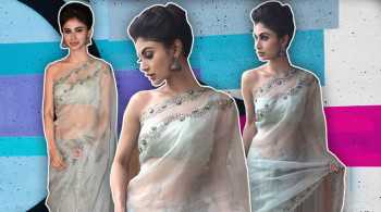Mouni Roy brings a sultry vibe in her sheer sari, but the make-up is a dampener