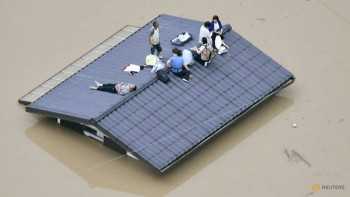 'Race against time' to rescue Japan flood victims: Abe