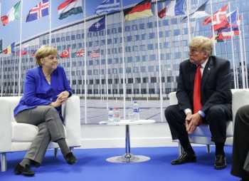 Trump rattles NATO, knocking its value and assailing Germany