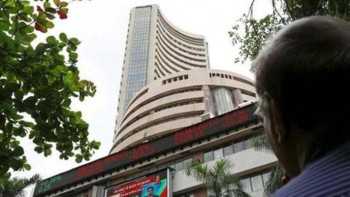 Sensex rallies over 300 pts; Nifty breaches 11,200 mark