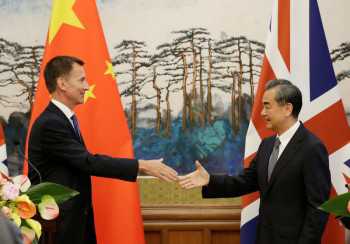 China tempts Britain with free trade as Hunt makes visit