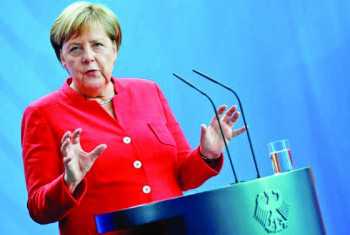 Merkel expects tough talks with Putin