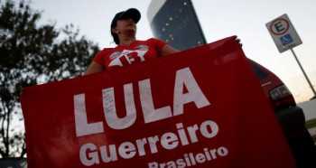 Lula banned from election but party stands by him