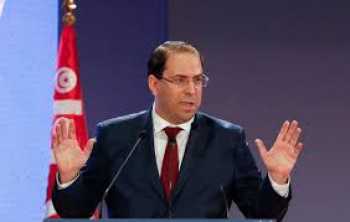 Tunisia ruling party suspends PM as rift deepens