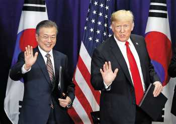 Moon, Trump Sign Revised FTA