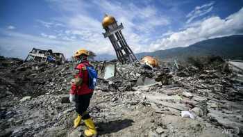 'We just find bodies': Quake survivor hopes turn to search for dead