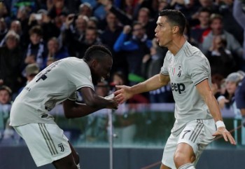 Embattled Ronaldo scores to keep Juventus perfect