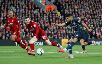 Man City's Mahrez misses late penalty in stalemate at Liverpool