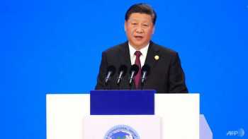 Xi pledges to open China's markets wider to an impatient world