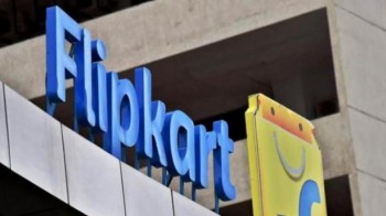 Flipkart and Amazon not abusing market position in India: CCI