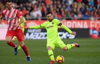Messi helps Barca sweep past Girona