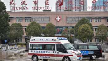 China deploys army medics to overwhelmed virus epicentre