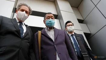 Hong Kong police detain veteran activists in raids