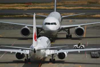 JAL cuts profit forecast a lot more than 40%