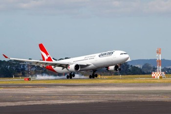Qantas flight makes emergency landing on way to London after smoke alarms triggered