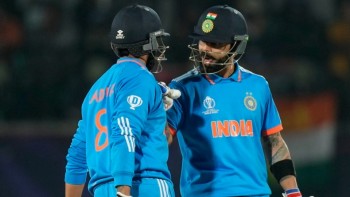 Shami and Kohli put unbeaten India top of the table