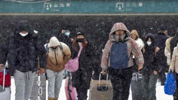 Icy weather in China disrupts travel rush ahead of Chinese New Year