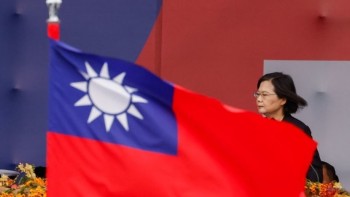 Taiwan president says ties with China must be decided by will of the people